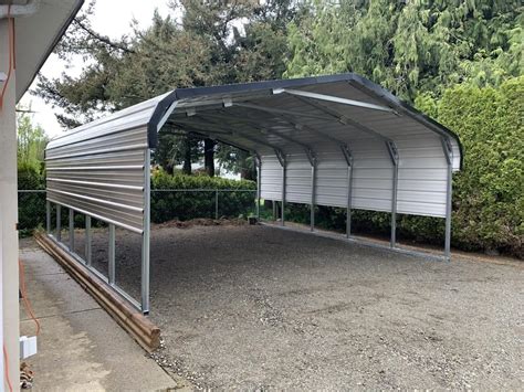 metal covered parking anchored to house|metal carport shelters.